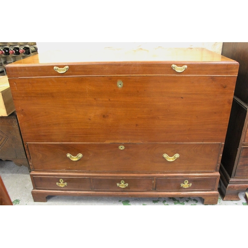 1873 - George III mahogany mule chest in two sections, the top section with lifting lid above a long frieze... 