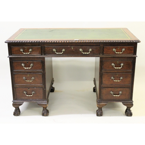 1875 - Edwardian mahogany pedestal desk with green leather writing surface above three frieze drawers on tw... 