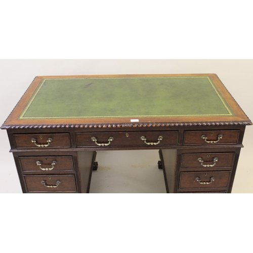 1875 - Edwardian mahogany pedestal desk with green leather writing surface above three frieze drawers on tw... 