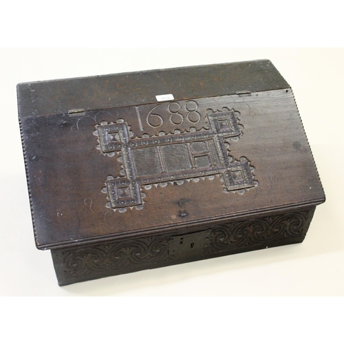 1879 - 17th Century oak bible box with original carved decoration and bearing date 1688, 63cms wide