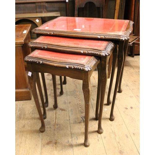 1895 - Early 20th Century brass and mahogany magazine rack, together with a nest of three reproduction occa... 