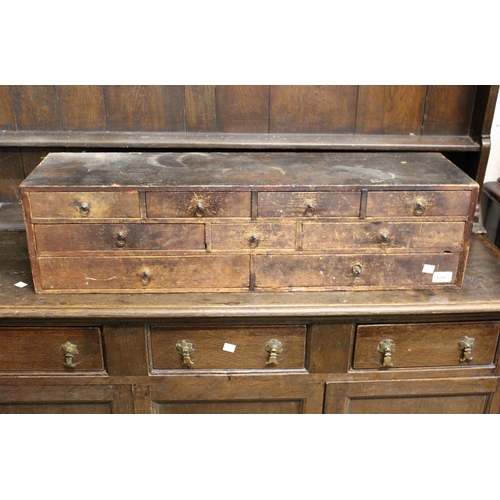 1898 - 19th Century pine bank of nine workshop drawers, 84cms wide together with a small oak wall bracket, ... 