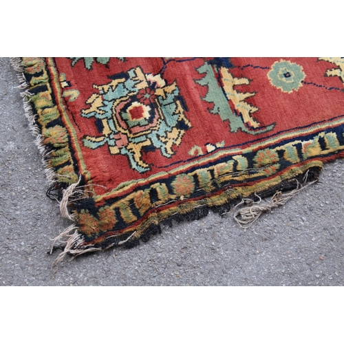 19 - Modern Turkish carpet with an all-over palmette design, on ivory ground with rust ground borders (da... 