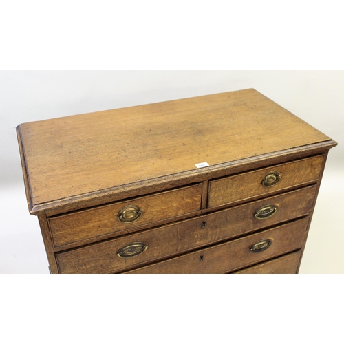 1901 - George III oak straight front chest of two short and three long graduated drawers with brass handles... 