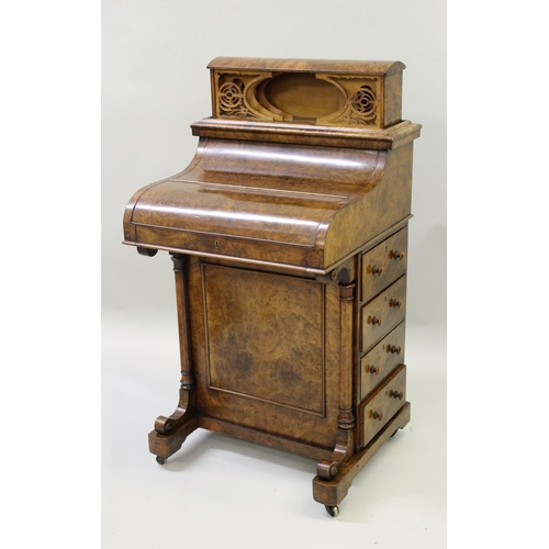 1903B - Good quality figured walnut Davenport, the rising top with stationary compartment above a hinged lid... 