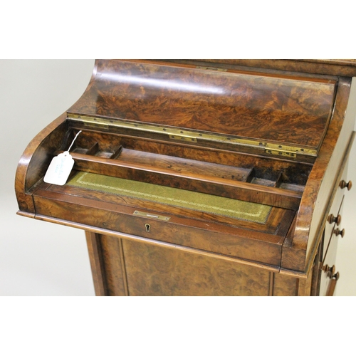 1903B - Good quality figured walnut Davenport, the rising top with stationary compartment above a hinged lid... 