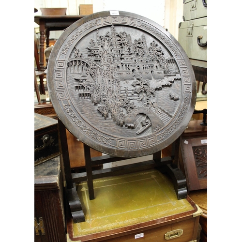 1914 - Chinese circular tilt-top occasional table with carved decoration (lacking glass top), together with... 