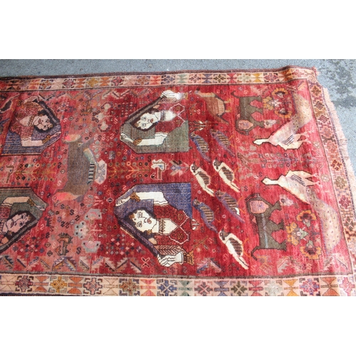 22 - Modern Gabbeh rug with an all-over animal, bird and pictorial design on a red ground with borders, 2... 