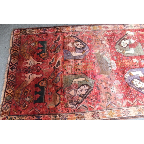 22 - Modern Gabbeh rug with an all-over animal, bird and pictorial design on a red ground with borders, 2... 