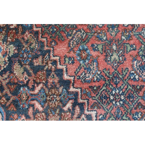 27 - Large Hamadan carpet of all-over Herati design in shades of blue, red and cream, 14ft x 11ft approxi... 