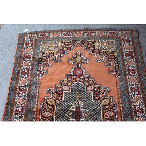 31 - Indo Persian rug with a lobed medallion and plain design, with corner designs and borders, 195cms x ... 