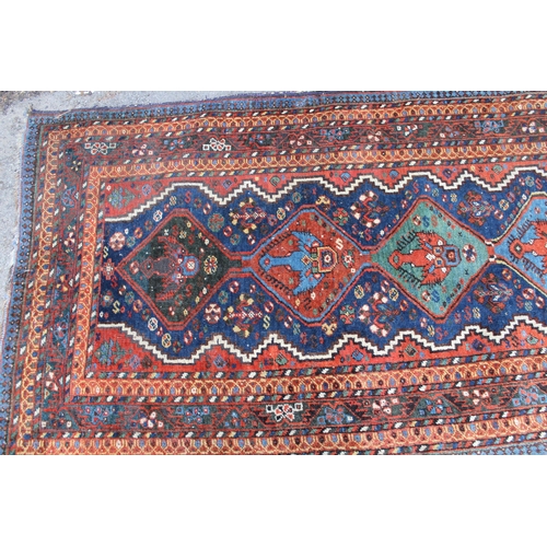 38 - Afshar runner with a repeating polychrome pole medallion design on a midnight blue ground with multi... 