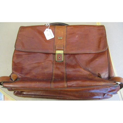 62 - Tan leather attaché case by Piquadro, together with another leather briefcase