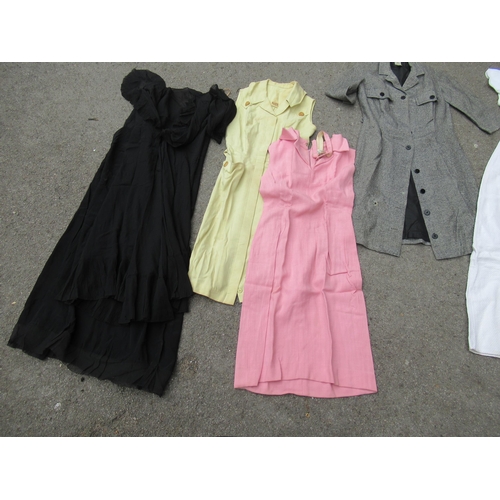 72 - Quantity of 1950's / 60's clothing including a 1950's cream evening dress and a black organza dress ... 