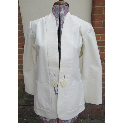 75 - Sheilagh Brown for Stirling Cooper, circa 1978, ladies cream jacket with single square button, size ... 