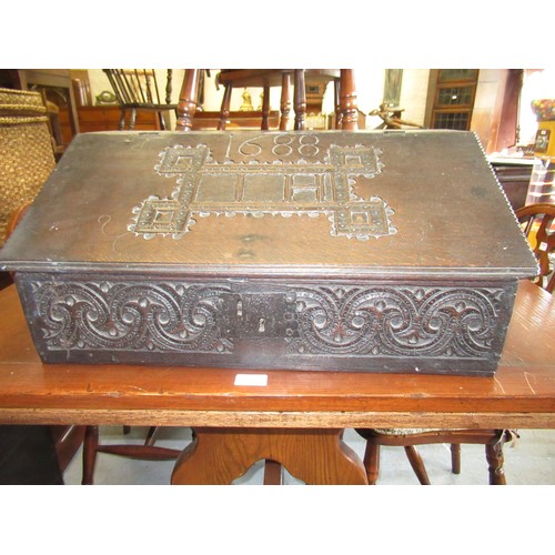 1879 - 17th Century oak bible box with original carved decoration and bearing date 1688, 63cms wide