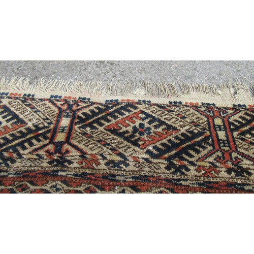 48 - Turkoman rug, the three rows of gols and multiple borders, on a faded red ground, together with anot... 