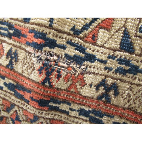 48 - Turkoman rug, the three rows of gols and multiple borders, on a faded red ground, together with anot... 