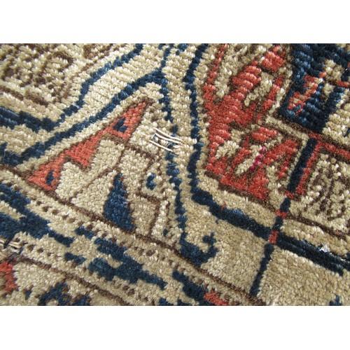 48 - Turkoman rug, the three rows of gols and multiple borders, on a faded red ground, together with anot... 