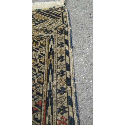 48 - Turkoman rug, the three rows of gols and multiple borders, on a faded red ground, together with anot... 