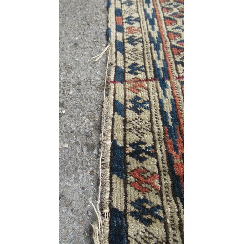 48 - Turkoman rug, the three rows of gols and multiple borders, on a faded red ground, together with anot... 