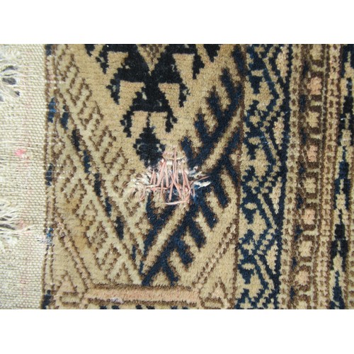 50 - Afghan rug, the three rows of eight gols and multiple borders on a washed wine, blue and beige groun... 