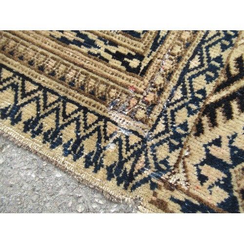 50 - Afghan rug, the three rows of eight gols and multiple borders on a washed wine, blue and beige groun... 