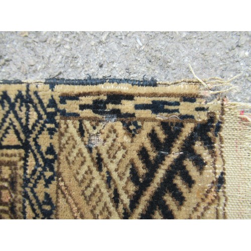 50 - Afghan rug, the three rows of eight gols and multiple borders on a washed wine, blue and beige groun... 