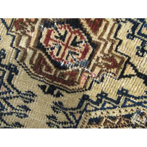 50 - Afghan rug, the three rows of eight gols and multiple borders on a washed wine, blue and beige groun... 