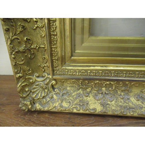 1888 - Small late 19th Century gilt picture frame, 38cms x 30cms aperture, with various slips