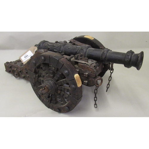 105 - Small wooden and bronze model cannon