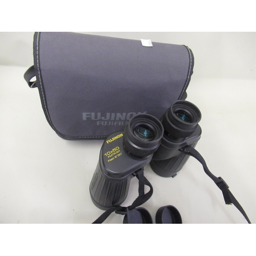 137 - Pair of Fujinon 10 x 50 binoculars, model FMTR-SX, in the original soft case