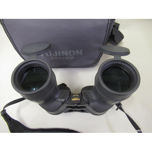 137 - Pair of Fujinon 10 x 50 binoculars, model FMTR-SX, in the original soft case