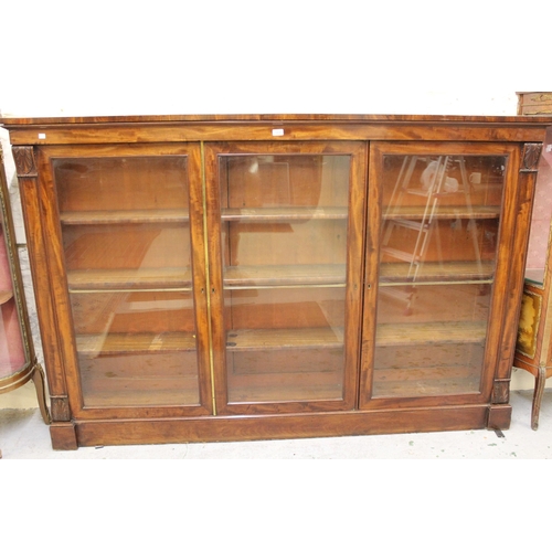 1484 - Good quality Victorian figured mahogany dwarf bookcase, the moulded top above three rectangular glaz... 