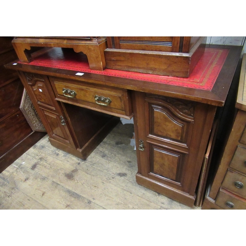 1488 - Victorian walnut twin pedestal writing desk, the red leather inset top above a central drawer flanke... 