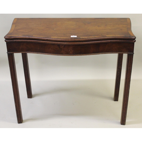 1493 - George III mahogany crossbanded and line inlaid serpentine fronted card table with a fold-over top, ... 