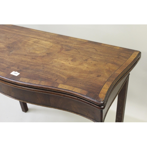 1493 - George III mahogany crossbanded and line inlaid serpentine fronted card table with a fold-over top, ... 