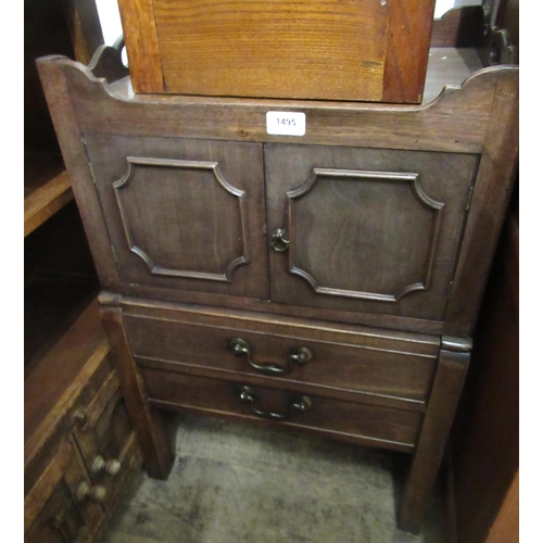 1495 - 19th Century mahogany tray top commode, with two flush panelled doors and applied moulding, above a ... 