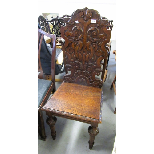 1519 - Victorian carved oak hall chair, together with a child's stickback chair and a bedroom chair