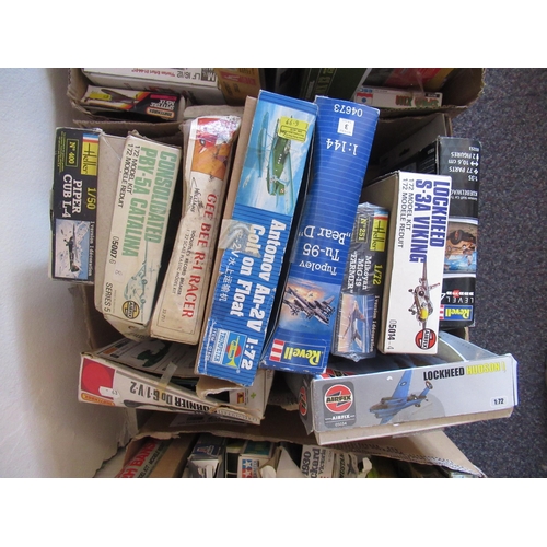 154 - Four boxes containing a large quantity of various unbuilt model aircraft kits by Airfix, Italeri etc... 