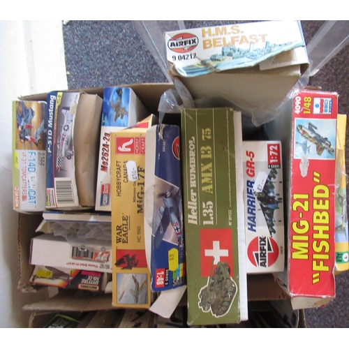 154 - Four boxes containing a large quantity of various unbuilt model aircraft kits by Airfix, Italeri etc... 