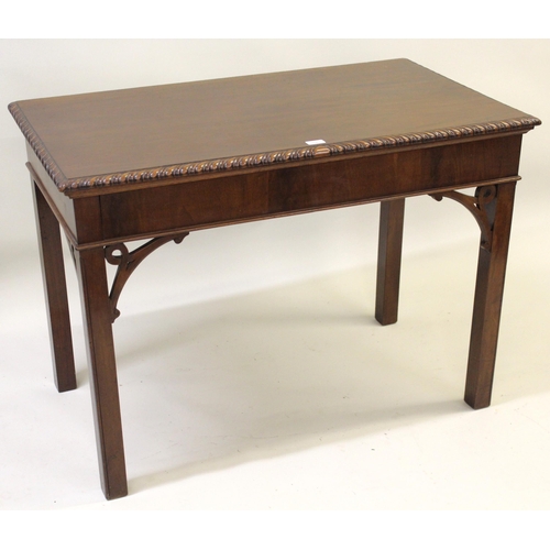 1541 - George III rectangular mahogany side table, the carved pie crust top above a shallow frieze, raised ... 