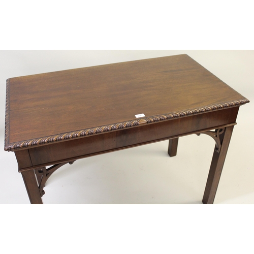 1541 - George III rectangular mahogany side table, the carved pie crust top above a shallow frieze, raised ... 