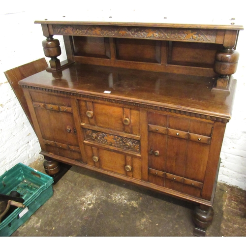 1552 - 1930's Oak sideboard with an arcaded back above drawers and cupboard doors on barley twist supports,... 