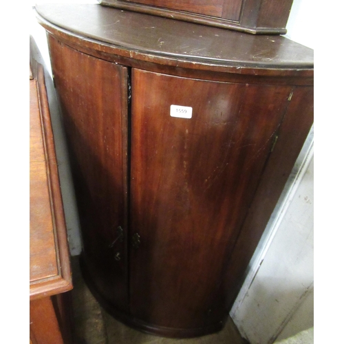 1559 - George III mahogany bow front hanging corner cabinet