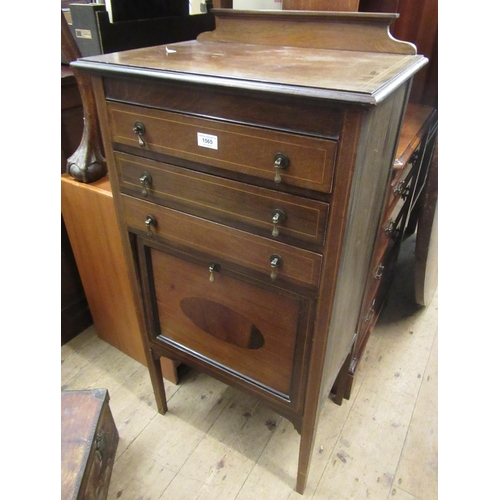 1565 - Edwardian mahogany and line inlaid music cabinet with three drawers above a fall front, on square su... 