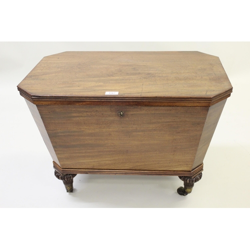 1567 - George IV mahogany wine cooler, the irregular octagonal reeded top above tapering sides and turned c... 