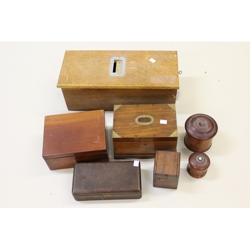 1588 - Two turned treenware boxes together with a quantity of other small wooden boxes and a mid 20th Centu... 