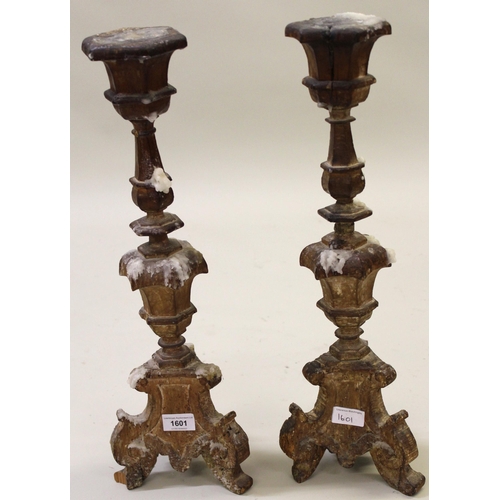 1601 - Pair of antique Continental carved lime wood Dutch style candle stands (some losses), 51cm high