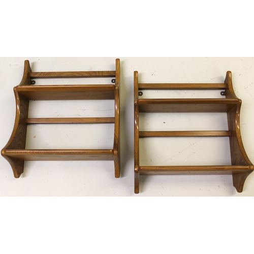 1608 - Pair of small Ercol light elm two shelf wall brackets, 43cm wide, one with original label, circa 197... 